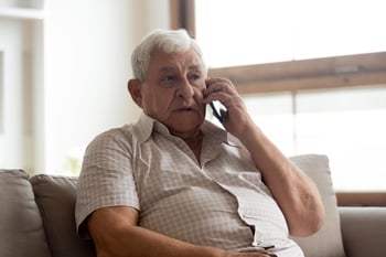 Elderly-man-talk-on-phone-having-distant-communication-with-doctor-1182248140_6240x4160
