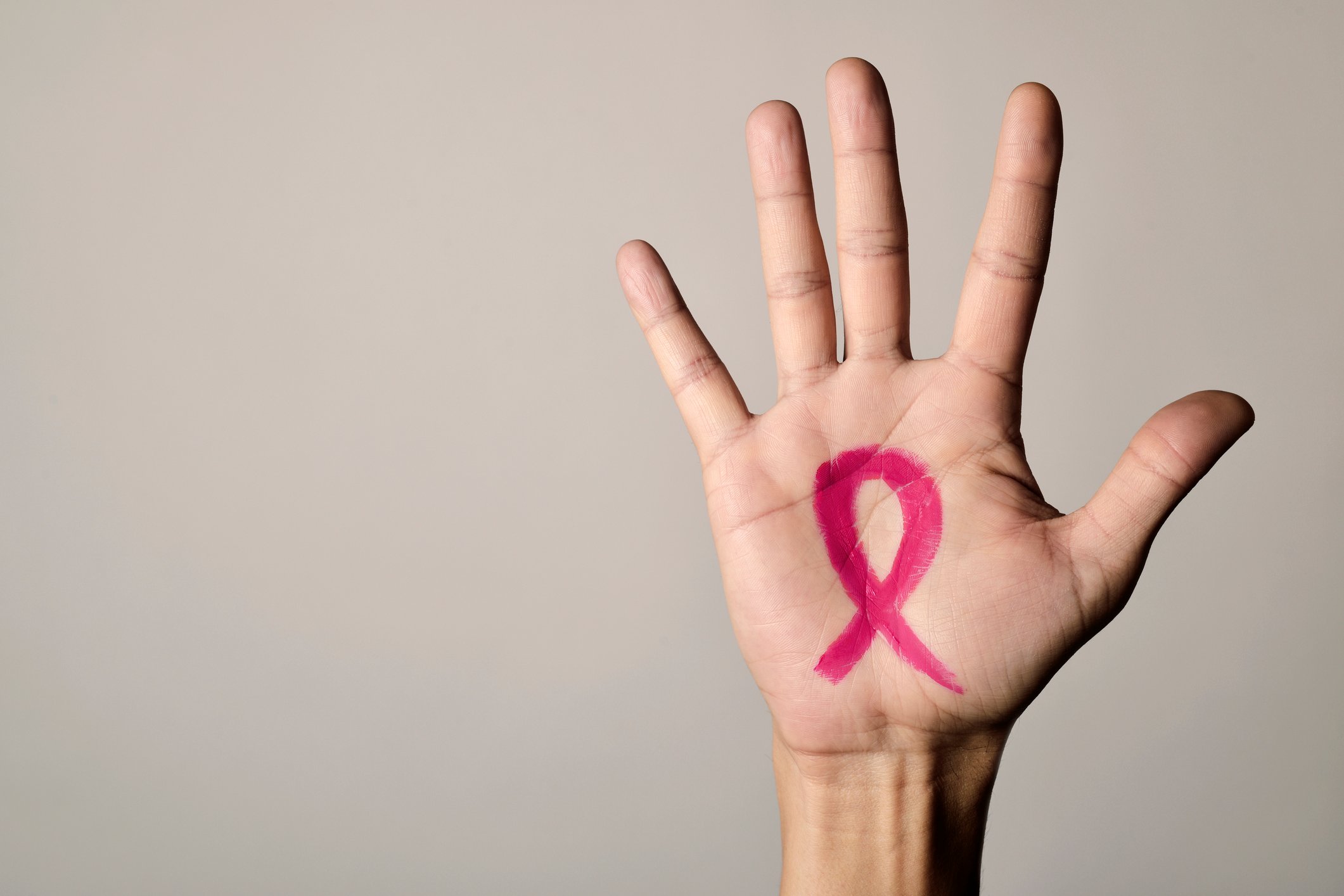 man-with-a-pink-ribbon-for-the-breast-cancer-855007916_2125x1417